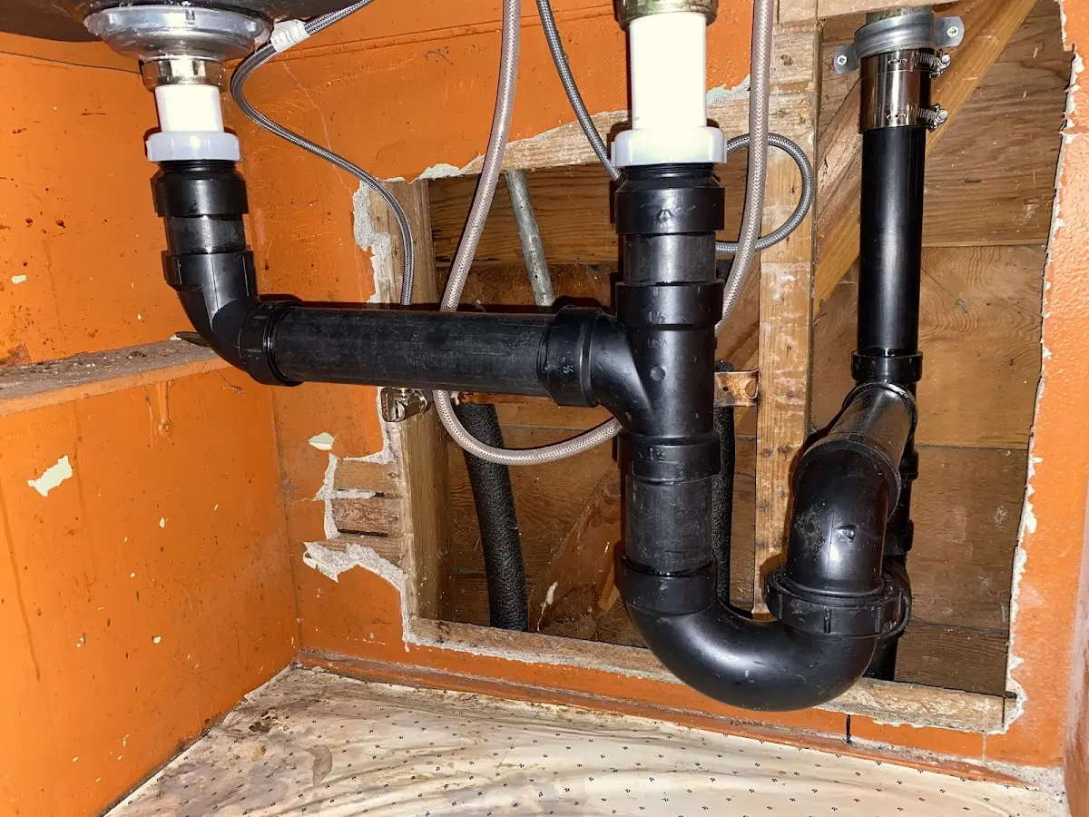 Professional Garbage Disposal Repair equipment and tools on the job in Derby